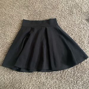 black skirt. size small. brand is Johnny. flowy and comfy.